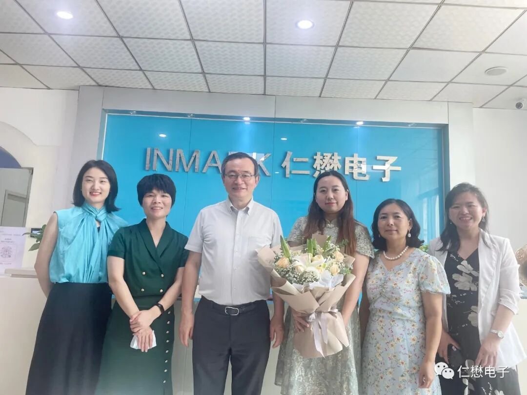 Academician Xu-Jin Wang and MOT representatives during the company visit
